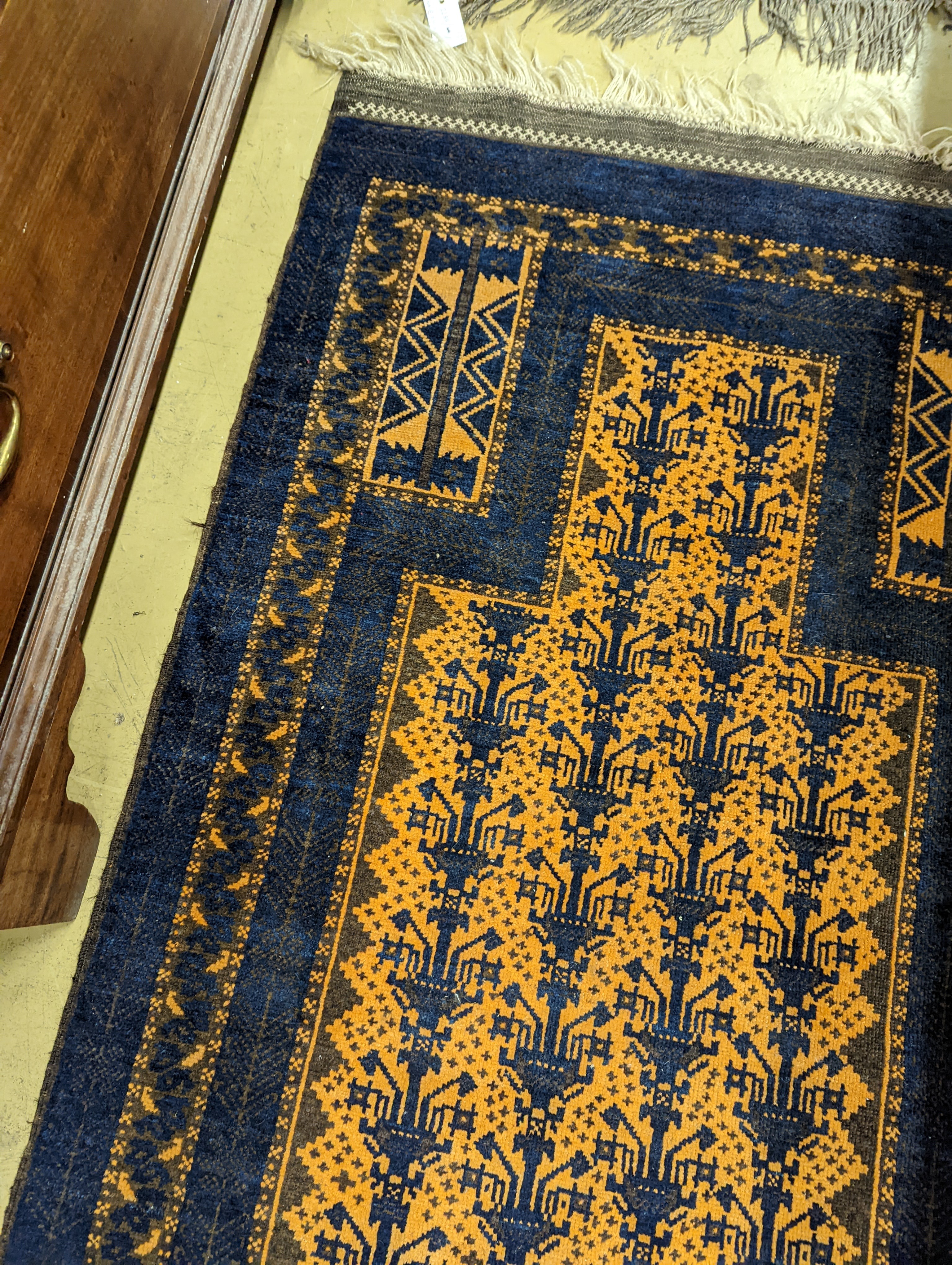 Two Belouch geometric prayer rugs, 106 x 57cm